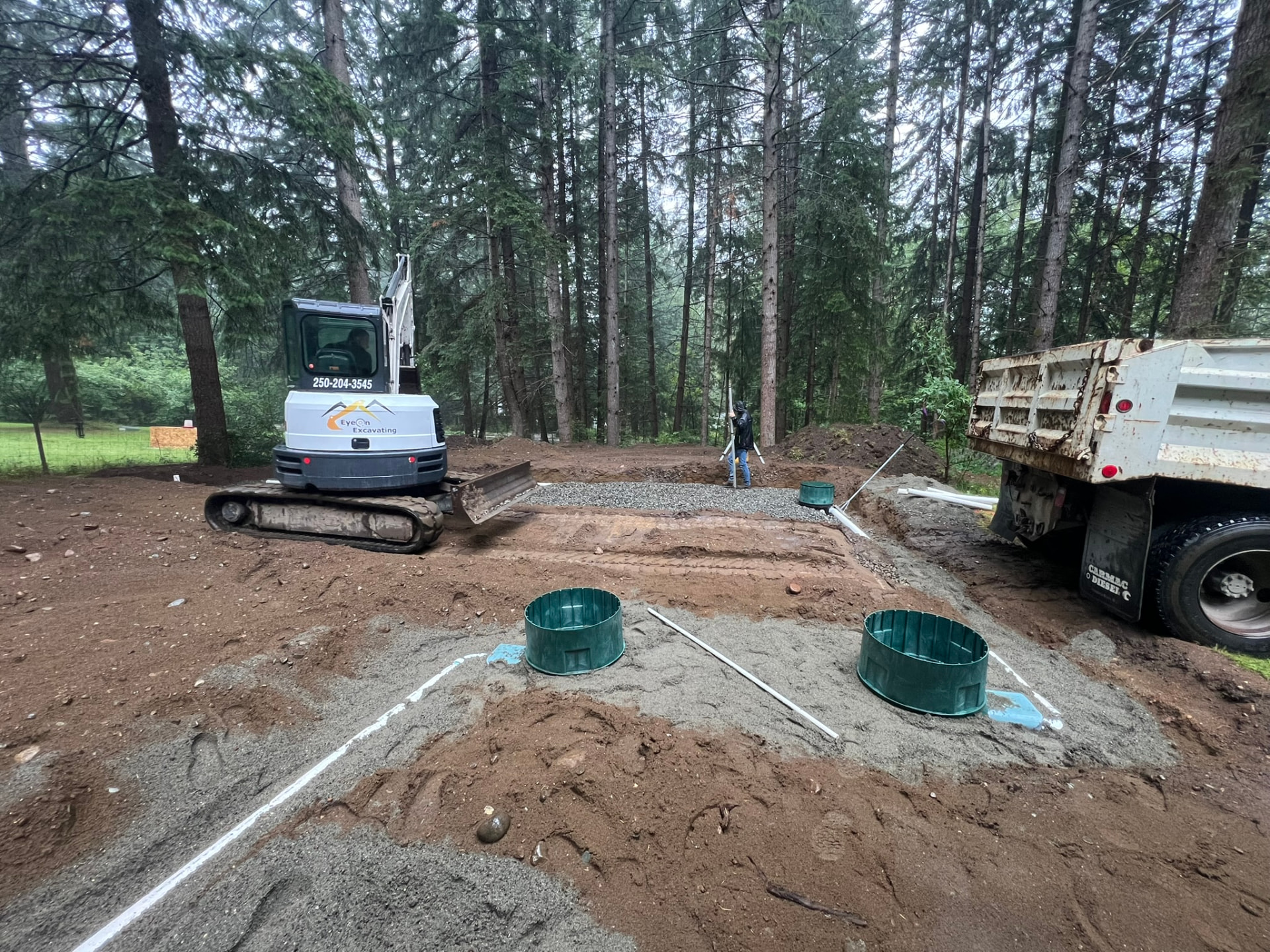 Septic tank risers set in the dispersal area during a Black Creek installation