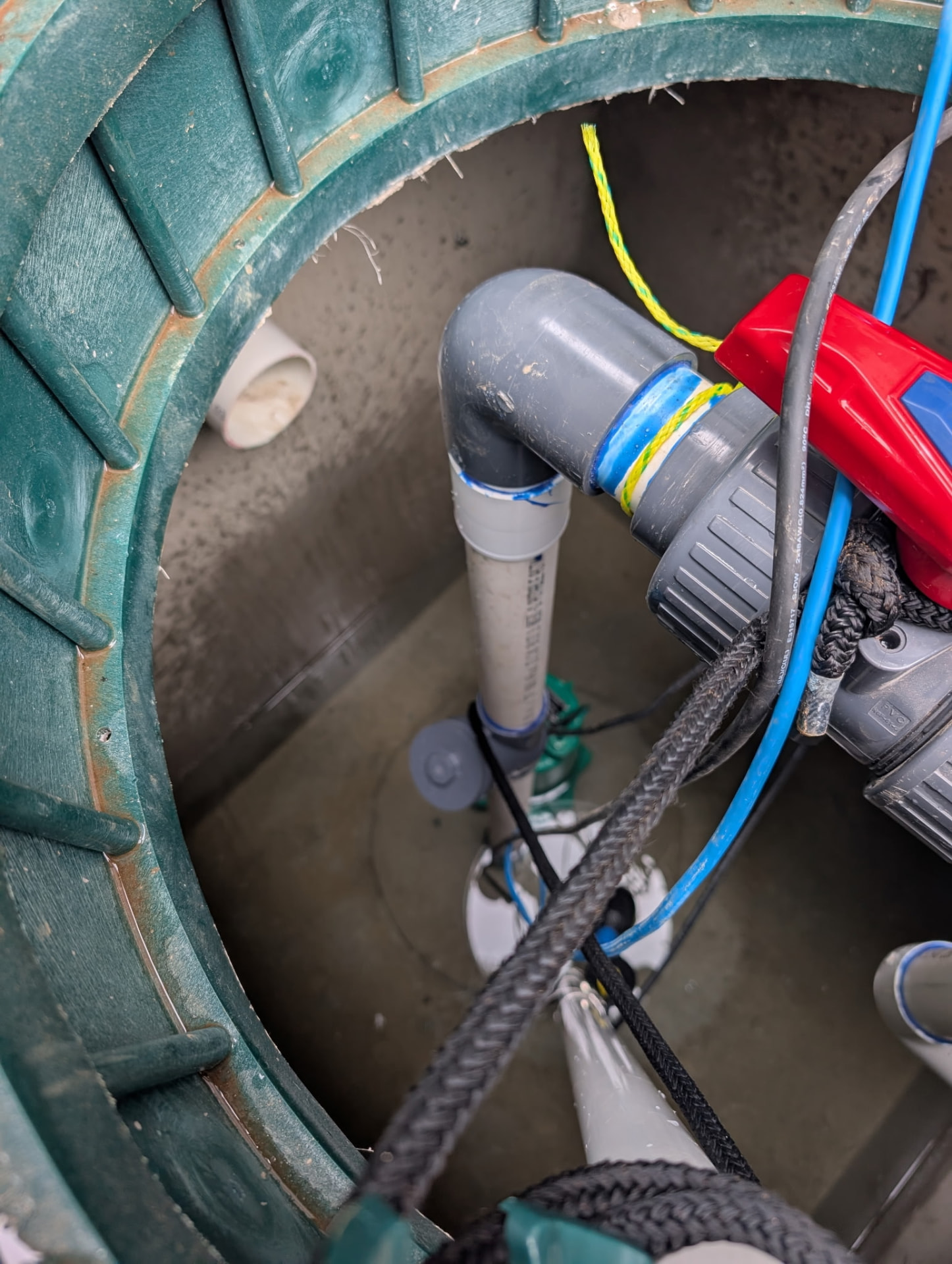Septic system components inside an access riser